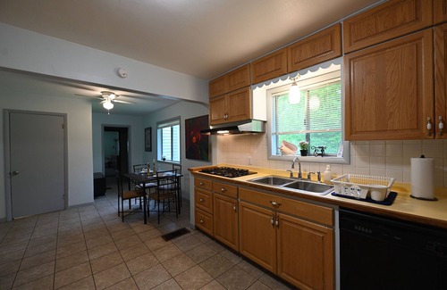 East Lansing House | Quiet 5 bedroom house on 3 acres plus woods, 5 min from MSU campus, easy access.
