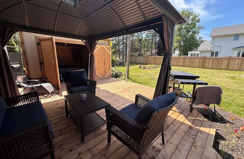 Summerside House | Relax with an enclosed hot tub and cozy island vibes in the heart of Summerside