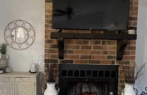 Alexandria House | Remodeled duplex with fireplace and patio