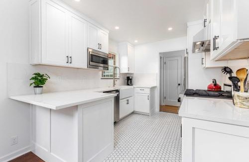 Fauntleroy House | Remodeled Home Fenced Yard Outdoor Fireplace