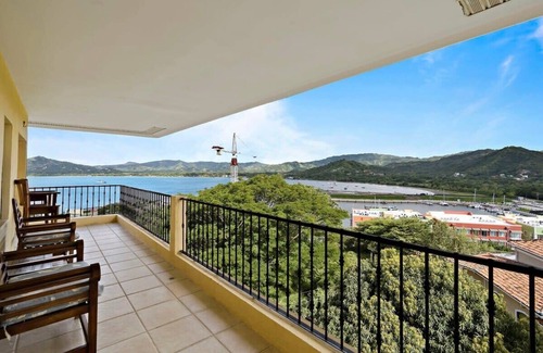 Playa Flamingo Condo | Remodeled Top-Floor Condo with Stunning Wrap-Around Balcony Offering Mountain, O