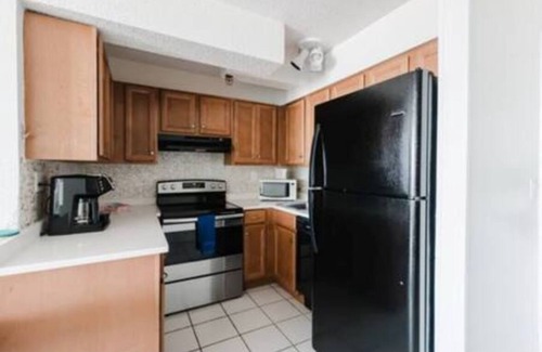 East Daytona Apartment | Remote Work Oceanfront Paradise w/Balcony Fast WiFi