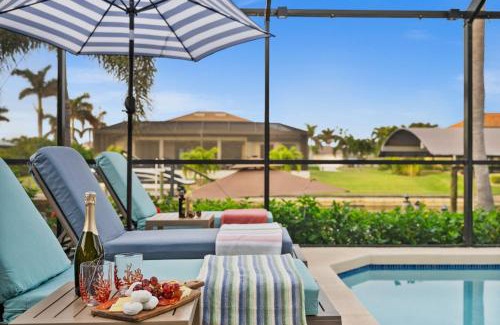 Pelican Villa | Resort Style House with Canal, Heated Pool, Games