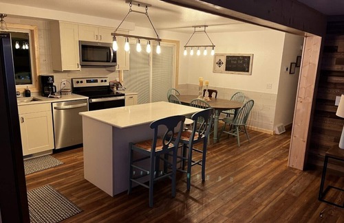 Iron River House | Ride your ATVs and snowmobiles directly from the house!