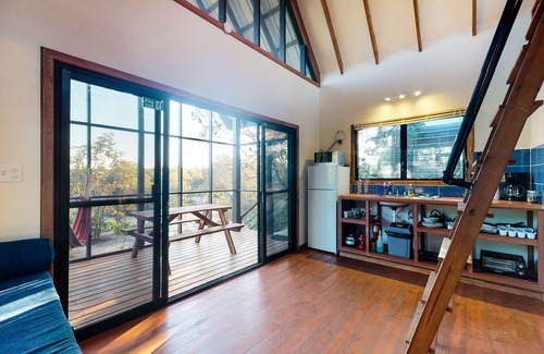 Surfside Cabin | Romantic cabana with veranda, hammock, partial AC & WiFi - walk to the beach