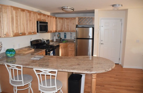 Seaside Heights Condo | Roof top pool & game room, 2 blocks to beach, 2/bedrooms, beach passes included