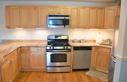 Seaside Heights Condo | Roof top pool & game room, 2 blocks to beach, 2/bedrooms, beach passes included