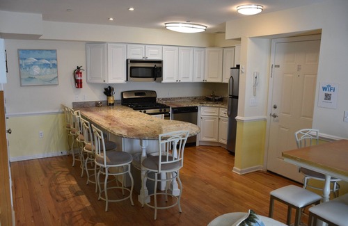 Seaside Heights Condo | Roof top pool & game room, 2 blocks to beach, 3/bedrooms, beach passes included