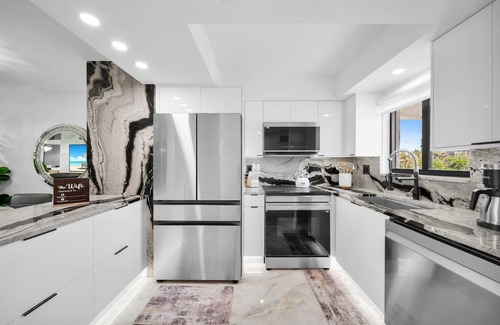 Mid Island Condo | SEASIDE 204. Luna Sea is a luxurious BEACHFRONT 2BR/2BA Condo in FMB