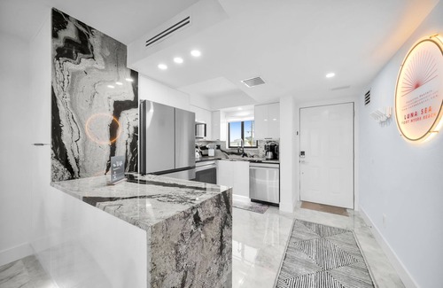 Mid Island Condo | SEASIDE 204. Luna Sea is a luxurious BEACHFRONT 2BR/2BA Condo in FMB
