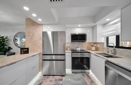 Mid Island Condo | SEASIDE 408. Sea La Vie is a luxurious BEACHFRONT 2BR/2BA Condo in FMB