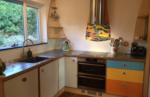 Treator House | Seaside House. Large living area opens onto elevated lawn. 2 mins walk to beach