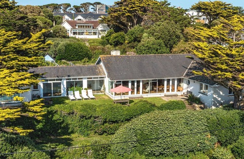 Treator House | Seaside House. Large living area opens onto elevated lawn. 2 mins walk to beach