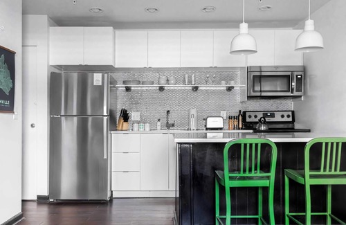 Rutledge Hill Cottage | Sleeps 8 4 Stylish Sobro Suites Near Music & Dining by Avantstay
