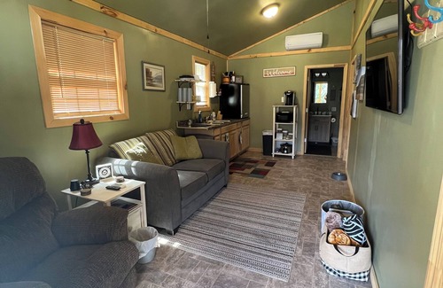 Matewan Cabin | SMUGGLERS RUN: Cozy Cabin, quick & easy access to Hatfield-McCoy trail heads.