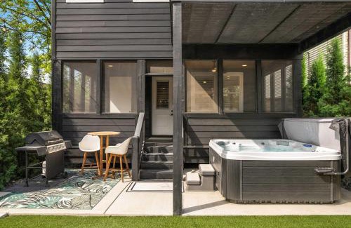 McFerrin Park House | Sophisticated Sanctuary Hot Tub Outdoor Haven