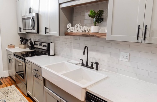 Lawrence Apartment | Spacious 3BD Loft in Heart of Downtown Lawrence. Licensed STR with parking.