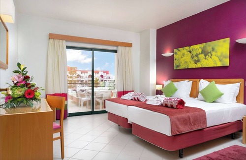 Oura Hotel | Spacious Family Apt w/Balcony, Kitchenette & Pool – 5-min Walk to Beach