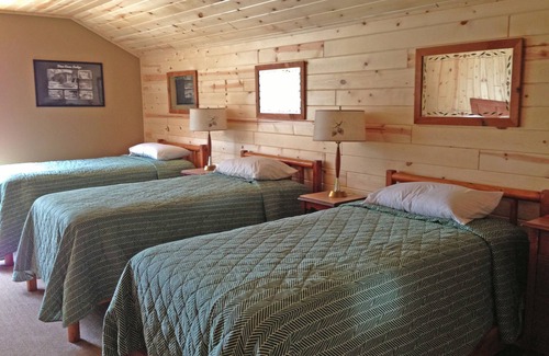 Park Rapids Resort | Spruce with two story high windows with loft on the premier lake of Big Sand