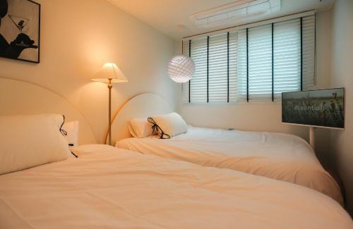 Hapjeong-dong Apartment | STAY H Hapjung Cine #Hapjeong #Hongdae #Airport Railroad #New building #3 queen beds #7 people #1 minute to YG Entertainment #Elevator #Parking #Air conditioner in each room #Luggage storage #Hotel-style bedding #Movie