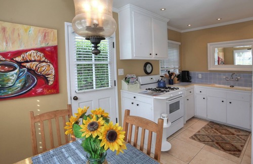 East Beach Cottage | Steps to the Sand: Enjoy beach views & a private fenced yard. Great for families