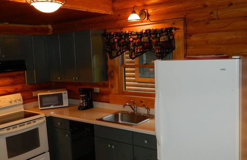 Cheboygan Cabin | Straits of Mackinaw log Cabin. Spectacular views of Mackinac Island! Kayaks incl