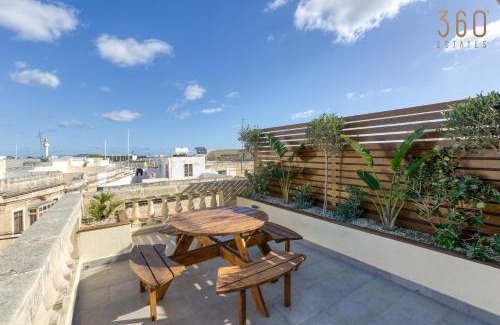 Paola Apartment | Stunning 3BR Townhouse with Private Rooftop Access by 360 Estates