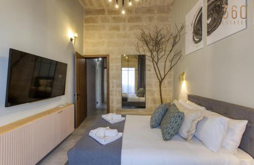 Paola Apartment | Stunning 3BR Townhouse with Private Rooftop Access by 360 Estates
