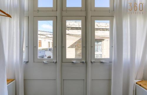Paola Apartment | Stunning 3BR Townhouse with Private Rooftop Access by 360 Estates