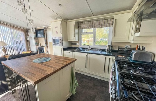Hopton on Sea Cabin | Stunning lodge with decking at Hopton Holiday Park in Norfolk ref 80023W