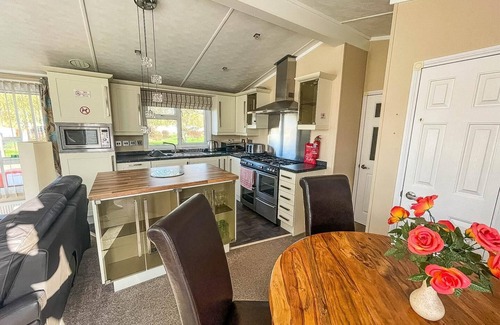 Hopton on Sea Cabin | Stunning lodge with decking at Hopton Holiday Park in Norfolk ref 80023W