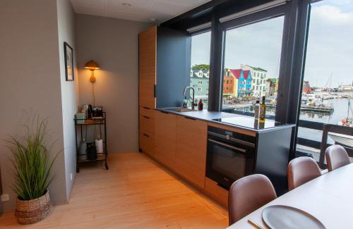 Torshavn Apartment | Stunning Marina View - Brand New - City Center