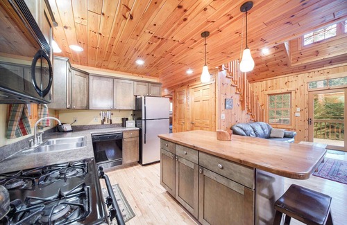 Cheboygan County Cabin | Sturgeon Riverfront Cedar Cabin
