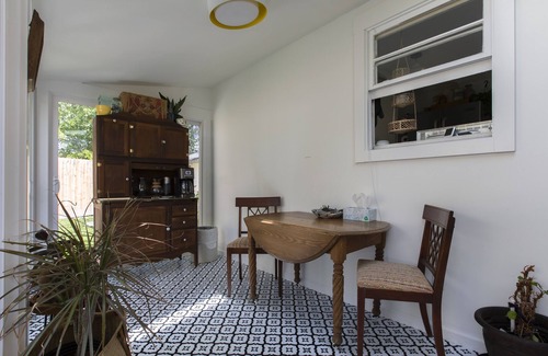 Brevard Cottage | Stylish mountain cottage walkable to downtown with private backyard.
