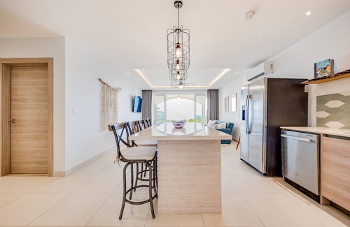 Tamarindo Apartment | Stylish, ocean-view condo on ground floor with pool, washer/dryer, & patio