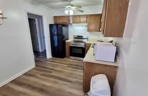 Greensboro House | Stylish Townhome Guest Room with Guest Bath