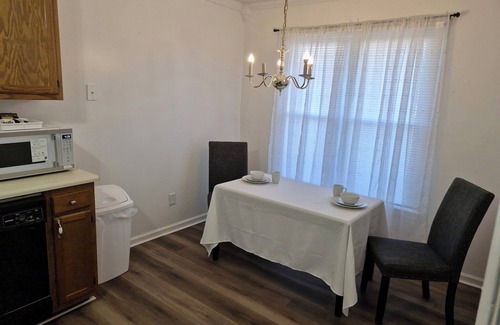 Greensboro House | Stylish Townhome Guest Room with Guest Bath