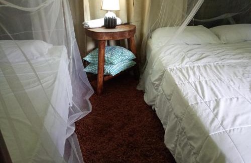 Katira House | su cabaña Río Celeste