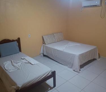 Iranduba House | Suites para casais com area nativa