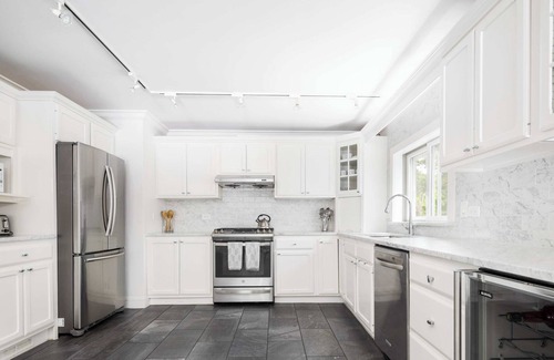 East Hampton House | Summerwood by Rove Travel Home with Pool & Hot Tub