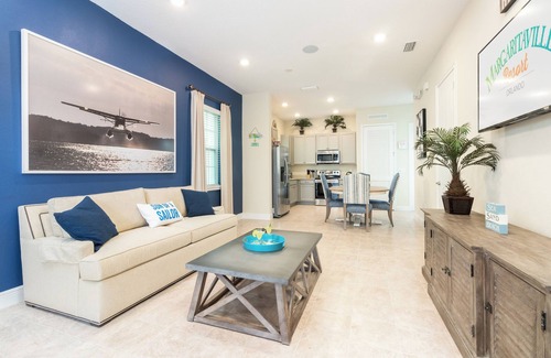 West Kissimmee Cottage | Sunny Margaritaville Cottage - Fully Equipped Kitchen, Welcoming Living Area