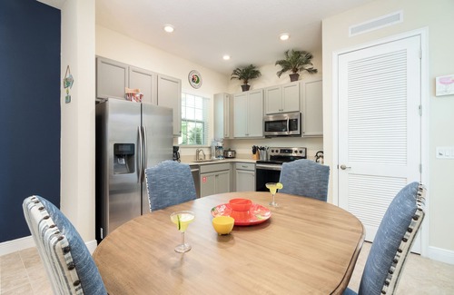 West Kissimmee Cottage | Sunny Margaritaville Cottage - Fully Equipped Kitchen, Welcoming Living Area