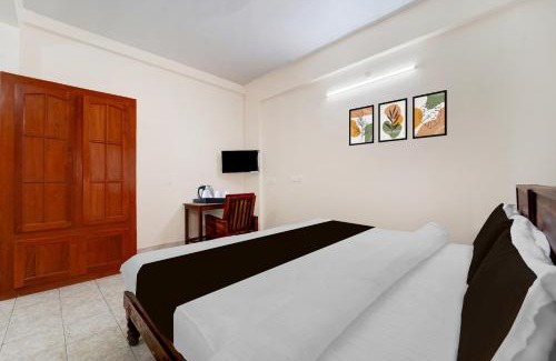 Kulanada Hotel | Super Hotel O Pathanamthitta Near Mahatma Gandhi Statue