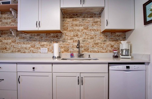 Panama City House | The Bay House - Pet Friendly! Basketball court, firepit - Walk to the Bay!