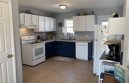 Chincoteague House | The Brass Crab - Check in/out any day!