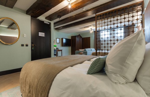 Nieuwmarkt en Lastage Hotel | The Hendrick's Hotel