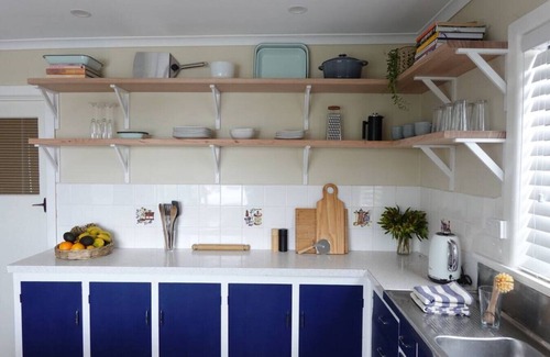 Primrose Sands Apartment | The Lazy Fig - Ocean Views, Orchard & Pizza Oven