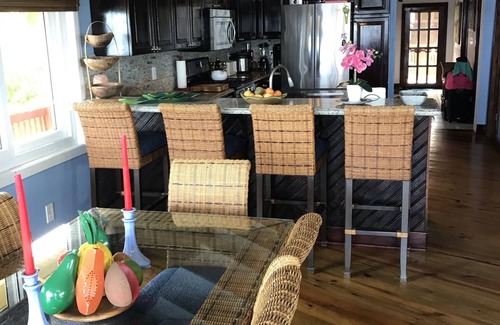Orchid Beach Village House | The Pink Orchid: Breathtaking Ocean Views from Waterfront Home