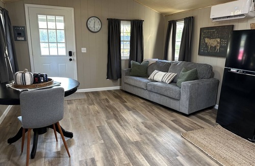 Apple Grove Cabin | This tiny cabin is a peaceful place complete with stocked pond and kayaks!