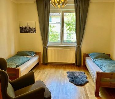 Sudstadt Apartment | Top Wohnung in Stadtvilla mit Terrasse und Garten